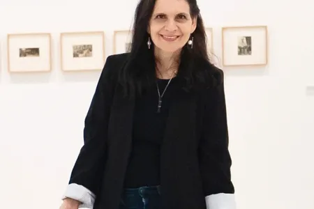 Katzman-Headshot-photo credit-Olive Santos-cropped lighter version.png