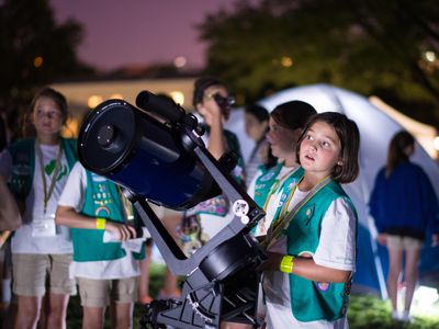 Girl Scouts can earn badges in space sciences by learning about astronomy and recreating scientific experiments.
