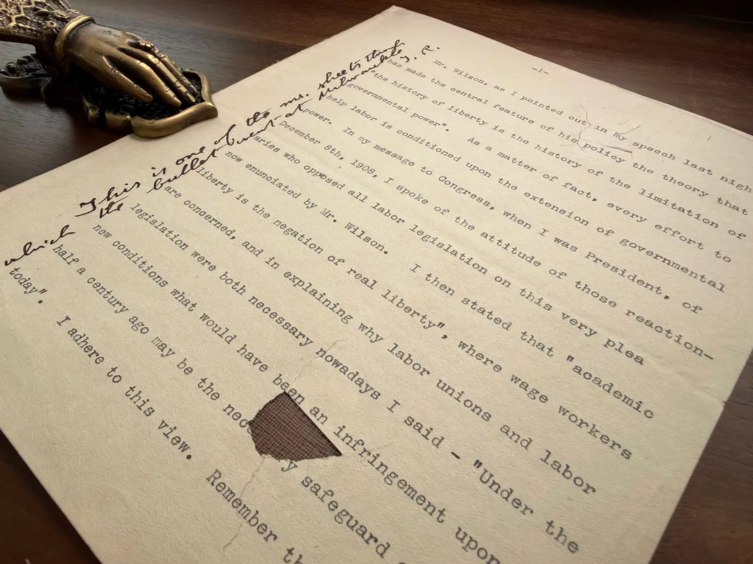 Bullet hole manuscript page