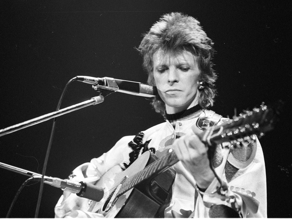 David Bowie performs onstage during his "Ziggy Stardust" era in 1973 in Los Angeles, California.