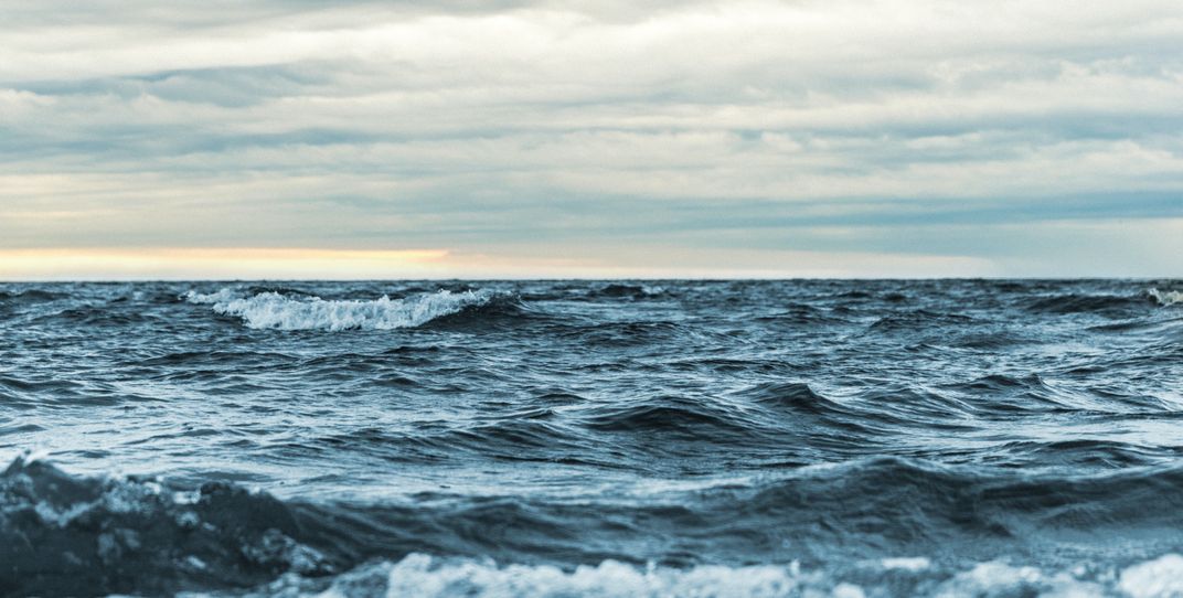 A choppy-looking ocean extends to the horizon.