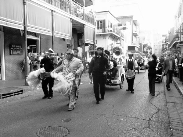 A Second Line Band leading a Jazz funeral on Bourbon Street thumbnail