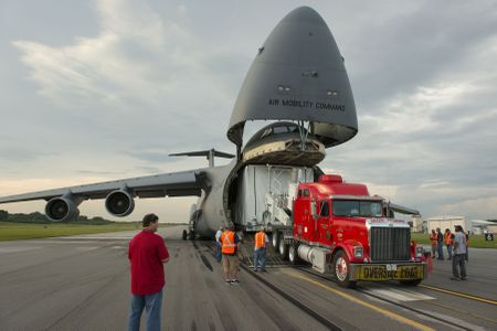 Webb's shipping container squeezes inside the hold of a Lockheed C-5B Galaxy with clearances of just two inches. 