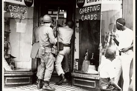 President Lyndon Johnson constituted the Kerner Commission to identify the genesis of the violent 1967 riots that killed 43 in Detroit and 26 in Newark (above, soldiers in a Newark storefront), while causing fewer casualties in 23 other cities. 