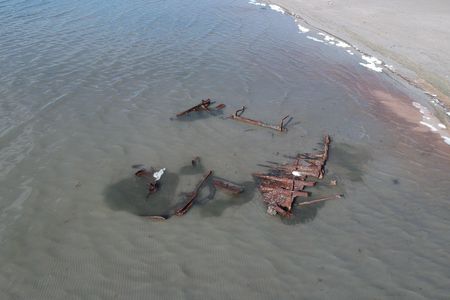 A storm on the Great Salt Lake in Utah exposed the wreckage of what may be a 100-year-old boat.