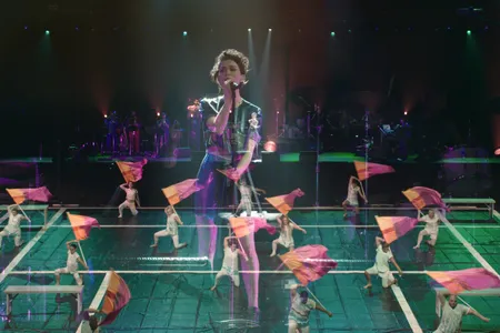 Singer-songwriter St. Vincent performs with color guard team Field of View.