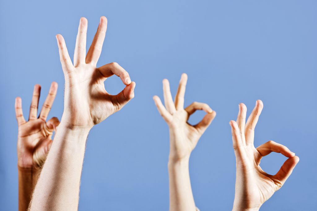 Hands signaling OK