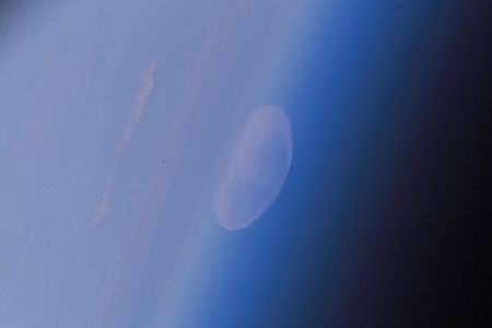 Space station astronauts get an odd view of the full Moon.