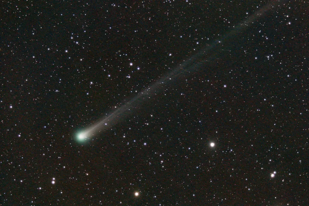 a green spot amid a sky of stars
