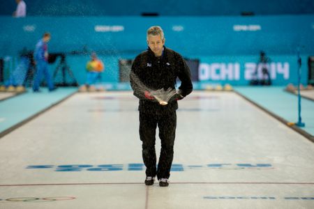 An ice maker pebbles the 2014 Olympic curling rink in Sochi.  