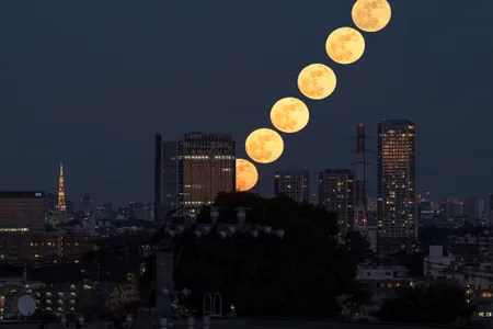 A compound image captures the rising moon over the Futako-Tamagawa Rise complex in Tokyo, Japan.
