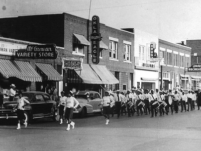 A few short years after the 1921 Tulsa Race Massacre, Greenwood&rsquo;s homes and businesses came back. This photograph shows a parade held in the Oklahoma neighborhood during the 1930s or &#39;40s.