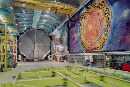 The octagonal 26-foot-tall MINOS detector is one of several experiments housed in a former iron mine in Minnesota; two others seek cosmic dark matter. 