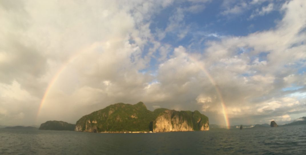 Full rainbow encircling Lagen, Philippines Smithsonian Photo Contest