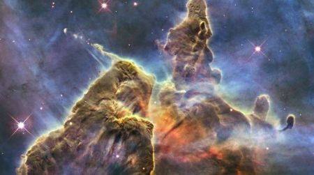 A budding star spits out jets of superheated gas and dust in the Carina Nebula