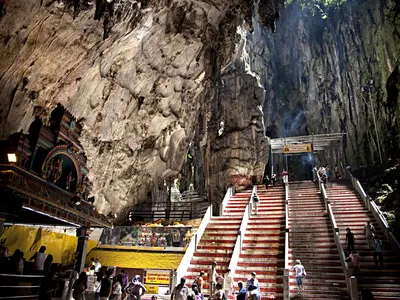 A little over a century ago, a limestone cave system north of Kuala Lumpur was reborn as a holy Hindu shrine, called Batu Caves.
