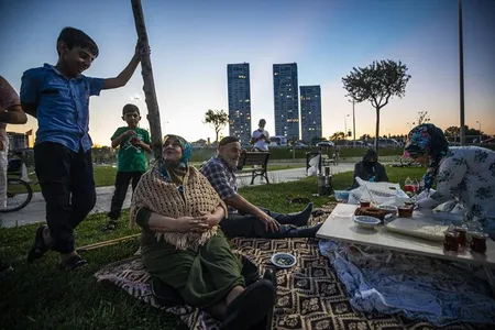 People enjoy a picnic at the Zeytiburna coastline in Istanbul, Turkey, on August 23, 2020.