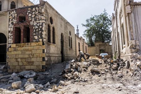 This picture taken on July 26, 2020 shows a cemetery undergoing demolition amidst ongoing construction at the historic City of the Dead.
