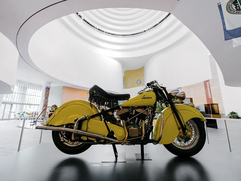 A 1948 Indian Chief motorcycle, a loan from the Barber Vintage Motorsports Museum in Birmingham, Alabama, is on view in the atrium of the museum. When Americans opens in the fall, the motorcycle will be moved to the exhibition gallery.