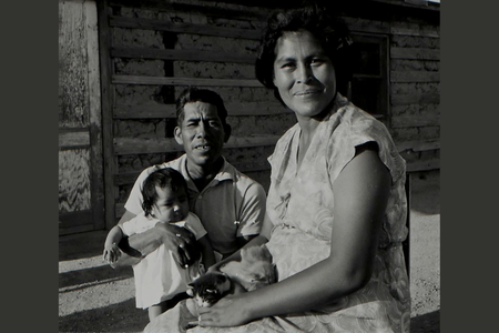 Patricia Stone (Akimel O'odham) and Leonard Stone (Akimel O'odham) with their new baby, 1965. Gila River Indian Community, Arizona.