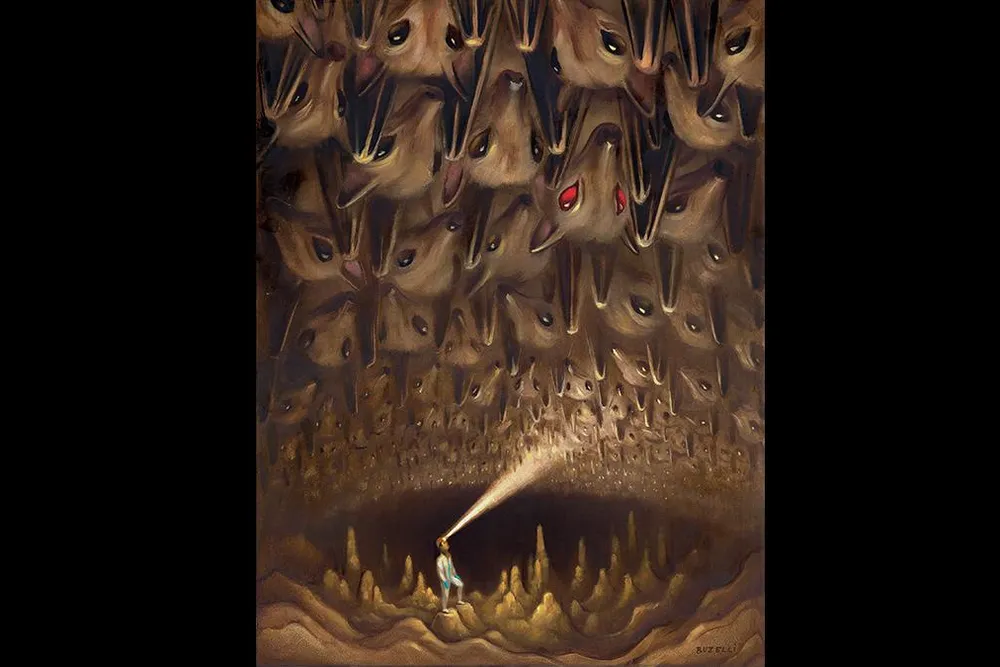 Virus Hunter in bat cave with a red eyed bat