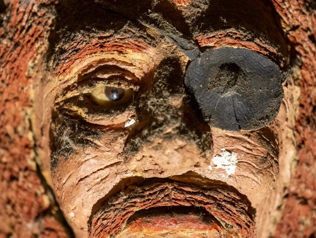 A wooden mask of a one-eyed pirate is mounted on one of the walls in the Pirates’ House in Savannah, Georgia. There were once tunnels under the tavern, which legend says that pirates sometimes used to spirit away kidnapped tipplers.