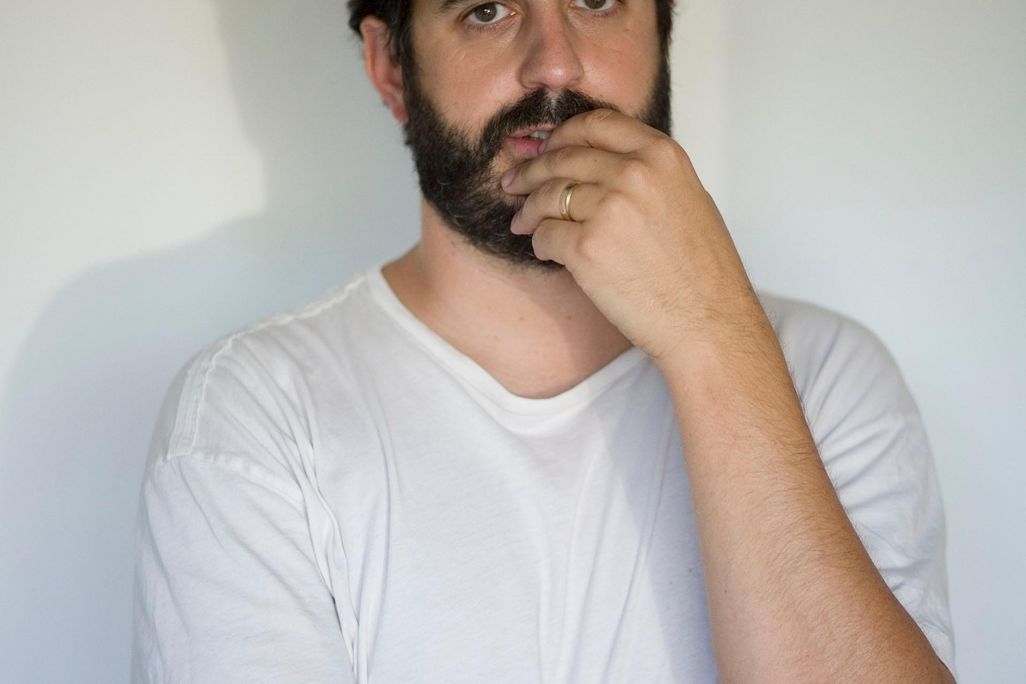 Photograph of Alec Soth taken in his studio