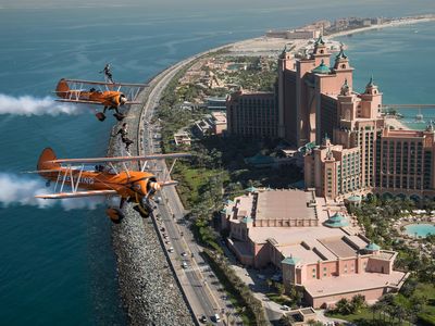 Breitling wingwalkers perform over the resort hotels on Dubai's Palm Islands.