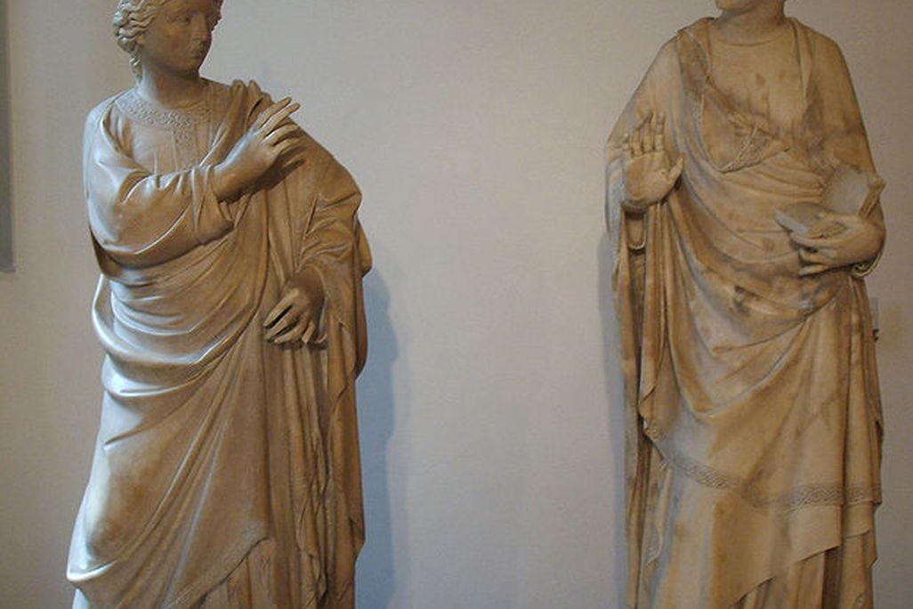 The statue on the right lost its delicately extended pinky earlier this week.