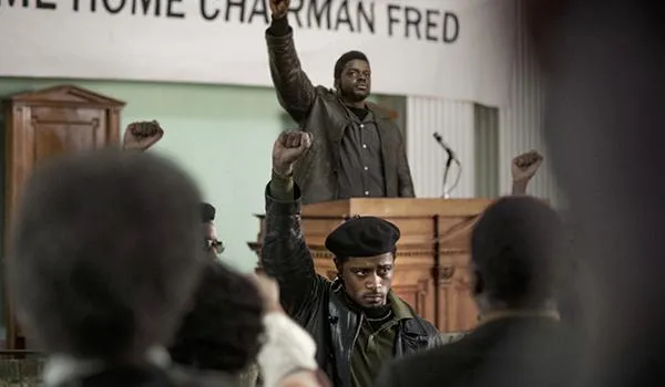 Movie Hampton and O'Neal raise their fists at a rally (mobile)