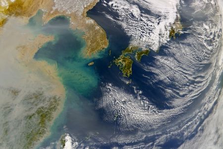 Clouds of haze rise above China, largely the result of the country's massive manufacturing industry.