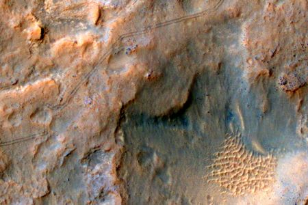 Curiosity's rover tracks on Mars, as seen from orbit in December 2013.