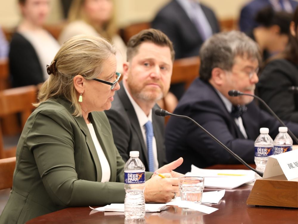 Dr. Suzan Murray, Program Director for the Smithsonian’s Global Health Program, reading her testimony at the House Science Subcommittee’s Coronaviruses: understanding the Spread of Infectious Diseases and Mobilizing Innovative Solutions hearing that occurred in March 2020.