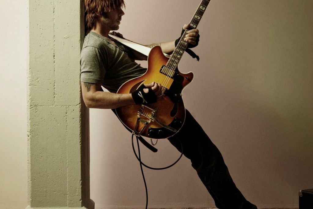 Man Playing Guitar