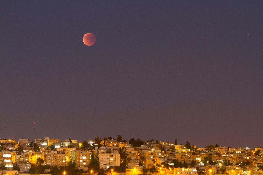 The Photos of the Rare Supermoon/Lunar Eclipse Convergence Do Not Disappoint