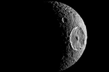 Saturn's moon Mimas has a giant impact crater, named Hershel, that stretches across a third of its surface and makes it resemble the "Death Star" from&nbsp;Star Wars.