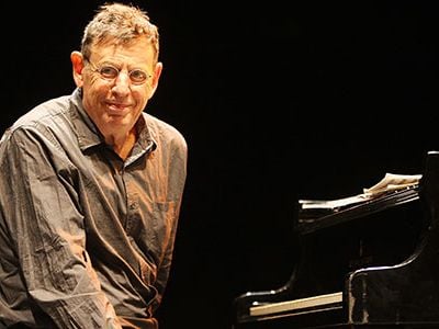 Born on January 31, 1937 in Baltimore, Phillip Glass began studying music at age 6.
