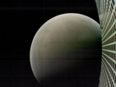 On November 26, 2018, MarCO-B returned this color image of Mars (and its own high-gain antenna) as it flew past the planet at a distance of about 4,700 miles.