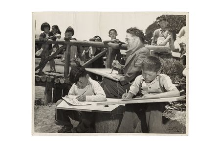 Photograph of Chiura Obata teaching a children's art class at Tanforan Art School, 1942 / unidentified photographer. Chiura Obata papers, circa 1891-2000, 1942-1945. Archives of American Art, Smithsonian Institution.