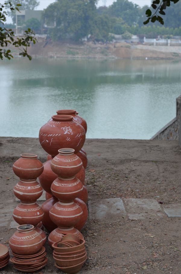 Pots on the bank of a river in Gujarat. thumbnail