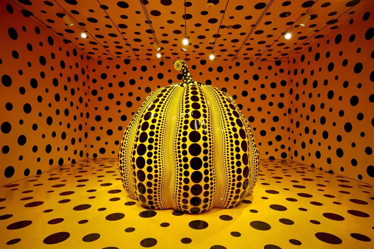 A large pumpkin sculpture by Yayoi Kusama, on view at the Smithsonian's Hirshhorn Museum and Sculpture Garden in 2023