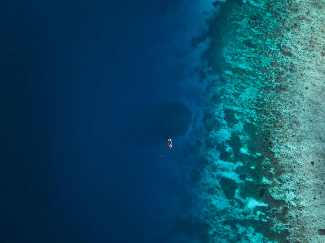 Aerial view of water and small boat