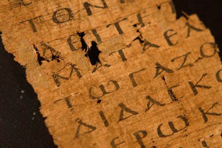 A fragment from a copy of the Gospel of John, circa 200AD, is displayed at Sotheby's auctioneers in London. Researchers now claim to have found a gospel text that is over 100 years older.