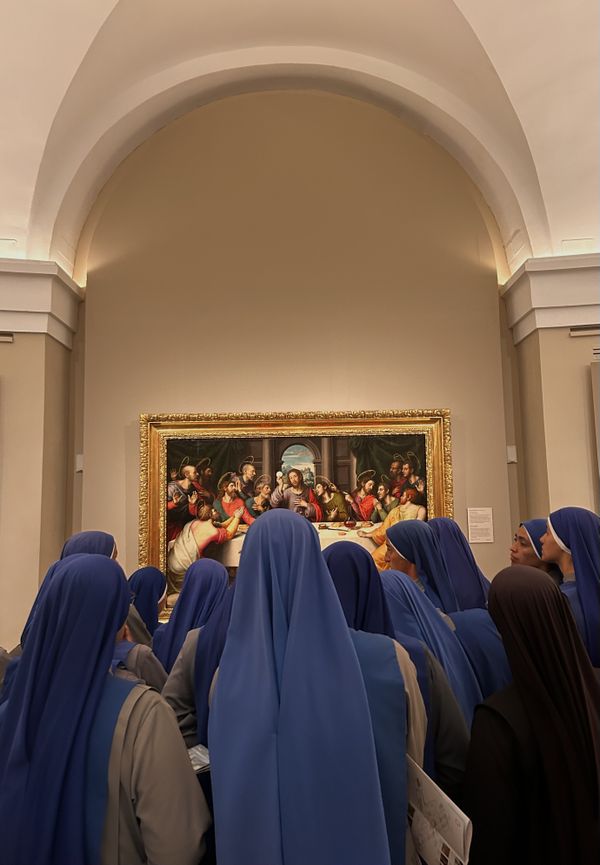 Spanish nuns admiring Leonardo da Vinci's 15th century painting, The Last Supper. thumbnail