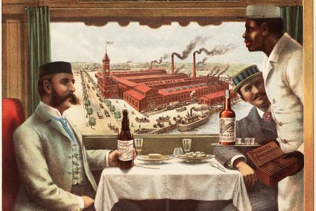 An 1894 advertisement shows the interior of a Pullman dining-car belonging to the Cincinnati, Hamilton, and Dayton Railway. The view through the window depicts the Mosler Safe Company factory in Hamilton, Ohio.