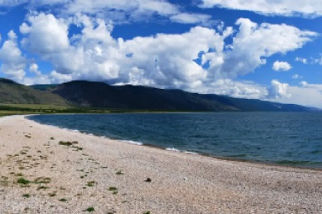 Desolate wilderness surrounds the giant Lake Baikal, the deepest, oldest and most voluminous lake on earth.