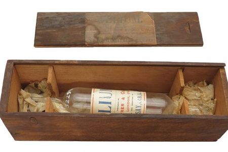 This glass tube, part of the museum’s collection, once contained a sample of helium. Its paper label reads, “HELIUM / SIR W. RAMSAY, K.C.B., LL.D., F.R.S. / THOMAS TRYER & CO., Ltd. / STRATFORD, LONDON, ENGLAND.”