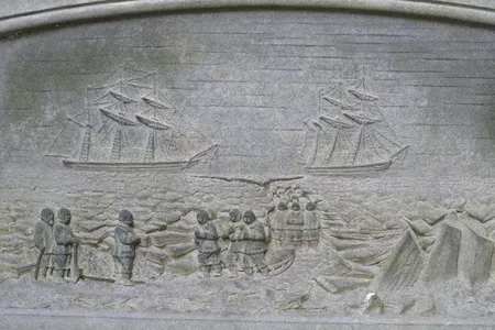 A stone etching on the grave of crewmember Lt. John Irving depicts the dire conditions that the Franklin expedition faced when they reached the Canadian Arctic. 