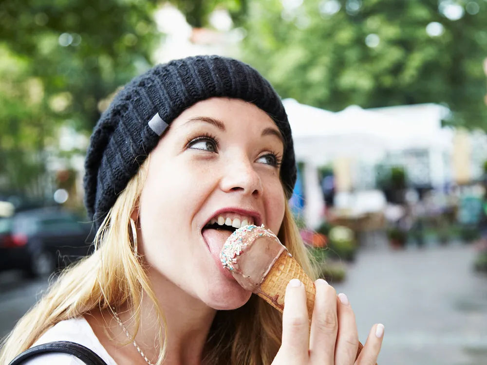 Woman Eating Ice Cream Cone
