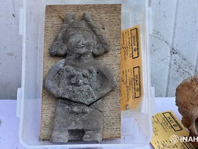 This blue-pigmented figurine was found buried with the oldest child.